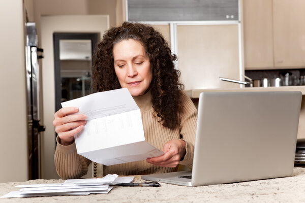 Woman paying bills