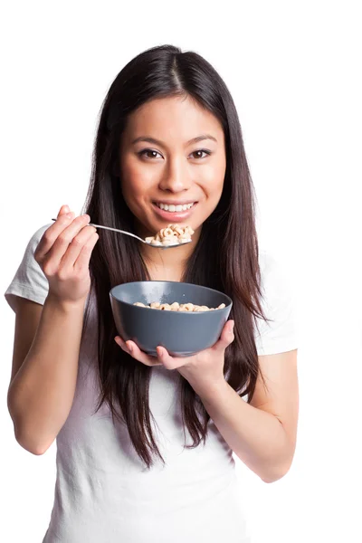 Asiatisk kvinna äta spannmål — Stockfoto
