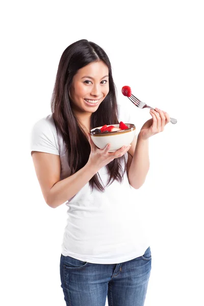 Asiatique femme manger fruits — Photo