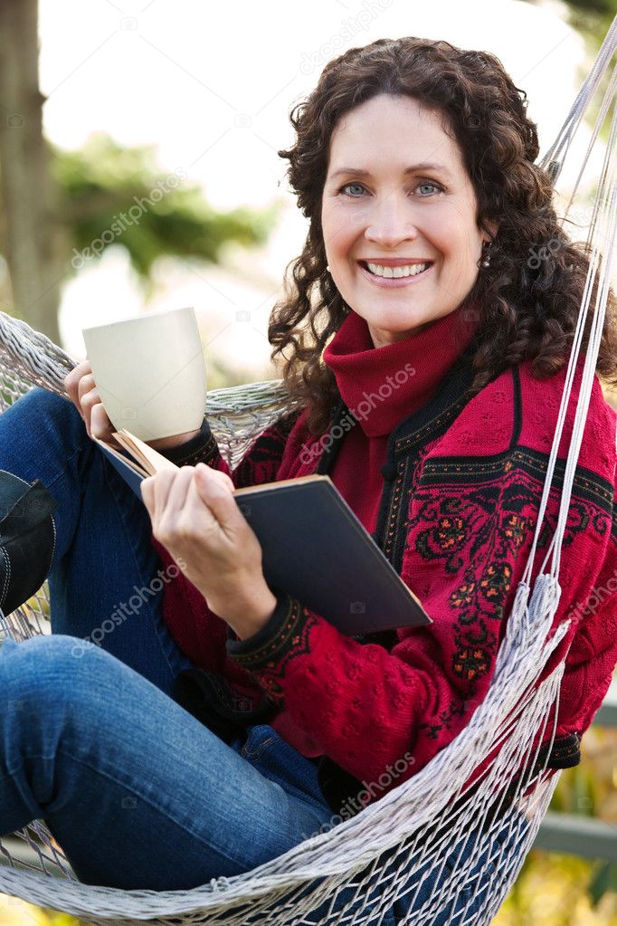 Mature woman reading a book