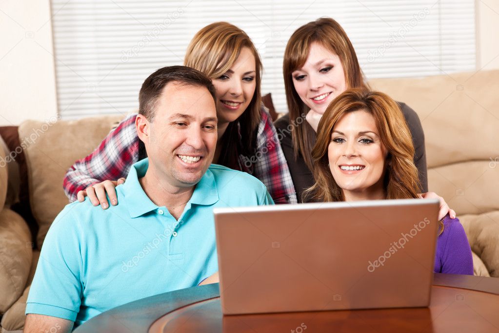 Family at home browsing internet