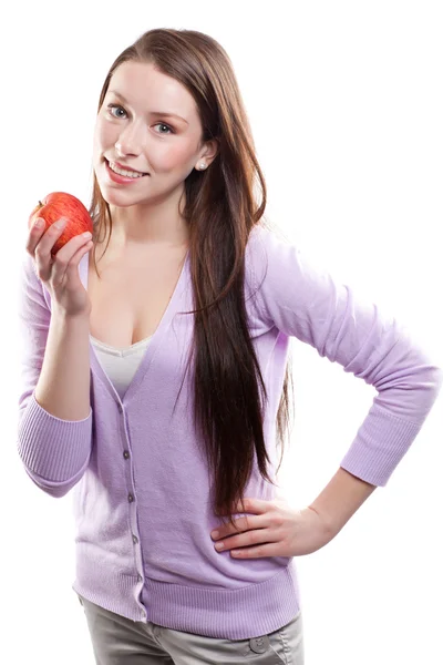 Женщина держит яблоко — стоковое фото
