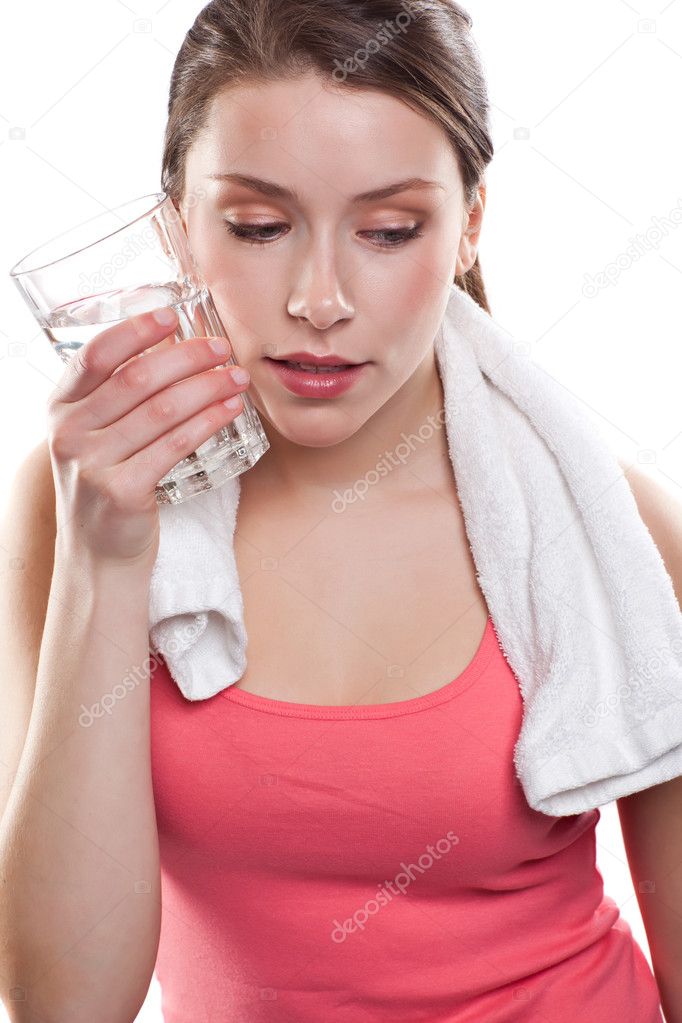 Sporty woman holding water