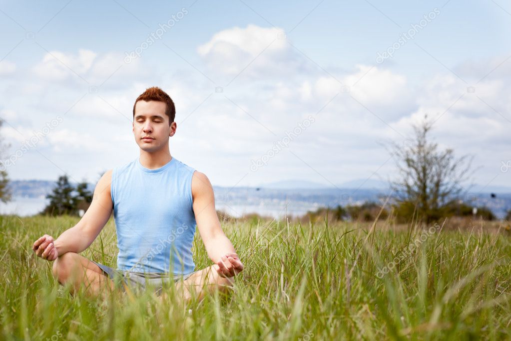 Mixed race man practicing yoga
