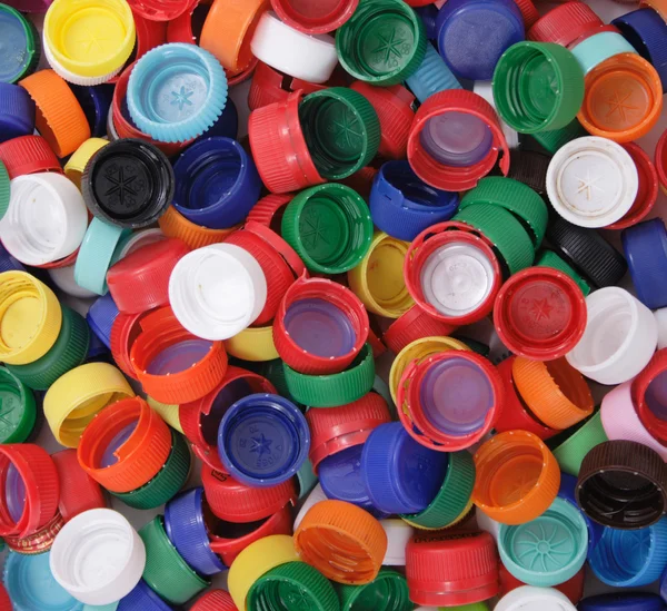 Fundo cpas de plástico — Fotografia de Stock