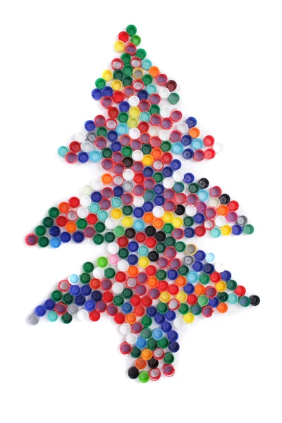 Tapas de plástico de color como árbol de Navidad — Foto de Stock