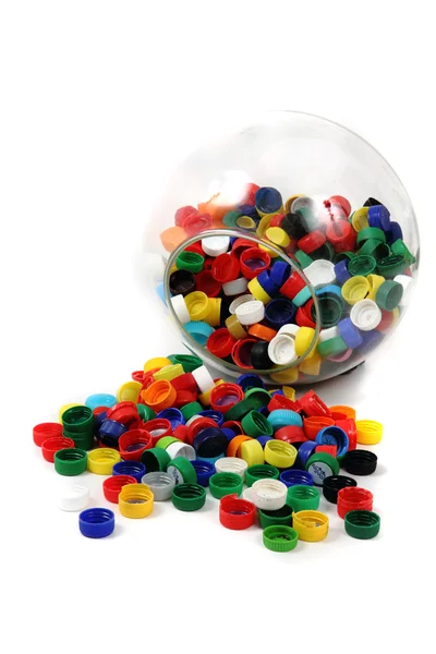 Tapas de plástico en la esfera de vidrio —  Fotos de Stock