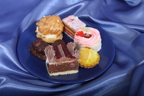 Selection of sweet deserts on the plate — Stock Photo, Image