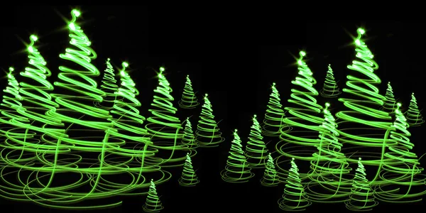 Christmas forest from the color lights — Stock Photo, Image