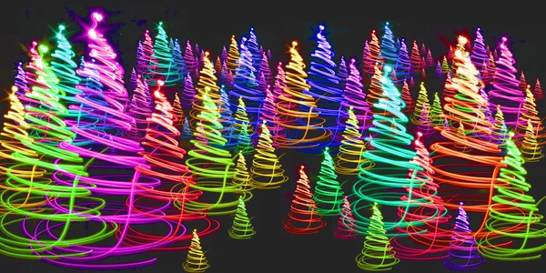 Рождественский лес из цветных огней — стоковое фото