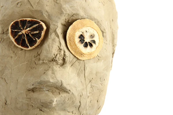 Estatua hecha a mano con ojos de limón —  Fotos de Stock
