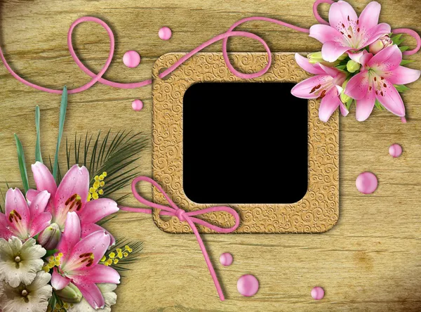 Ročník fotografické rámečky a růžové lilie — Stock fotografie