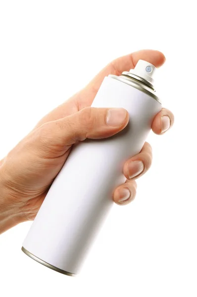 Ręka trzyma spray — Zdjęcie stockowe