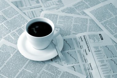 Coffee over newspaper clipart