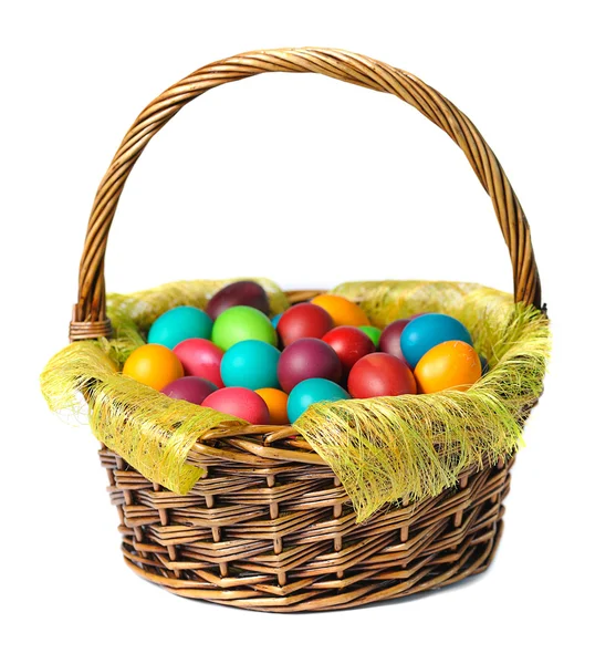 Huevos de Pascua en cesta Imagen de archivo