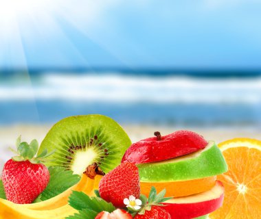 Fruit on a beach clipart