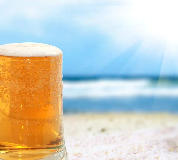 stock image Beer on a beach