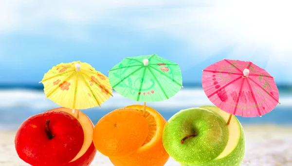 Fruit cocktail on a beach — Stock Photo, Image