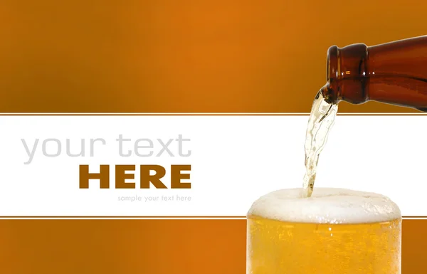 stock image Glass of beer closeup with froth