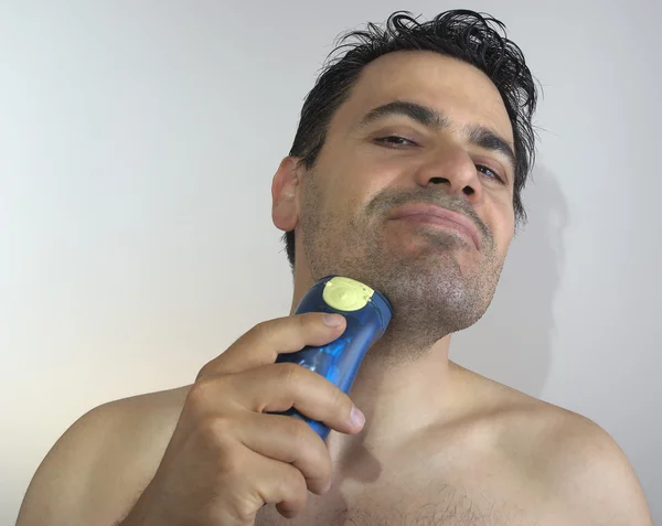 Man Shaving by shaver Stock Photo