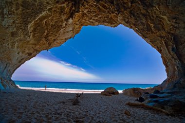 Paradise cave sea blue sky vacation clipart