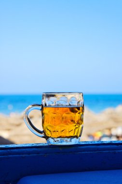 Mug of cold beer. clipart