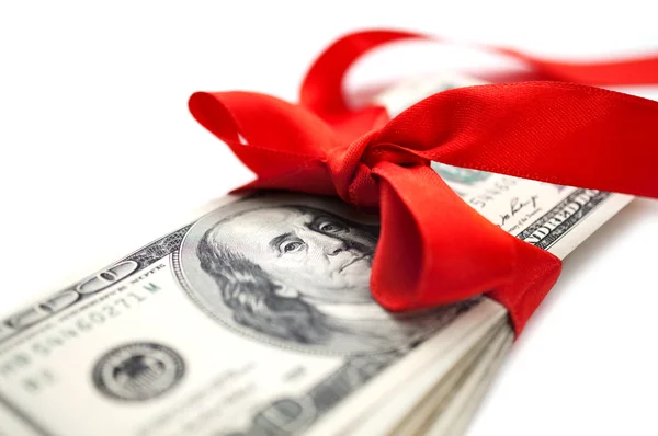 Dollars with red ribbon — Stock Photo, Image