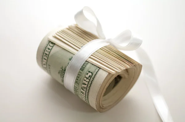 Dollar roll tightened with ribbon — Stock Photo, Image
