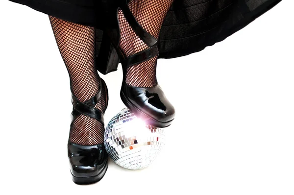 stock image Dancers legs with disco ball