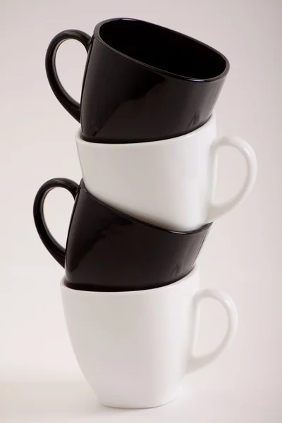 Дизайн четыре кофе кружки — стоковое фото