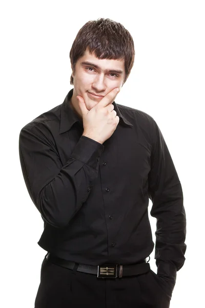 Νεαρός άνδρας στο μαύρο πουκάμισο που απομονώνονται σε λευκό φόντο — Φωτογραφία Αρχείου