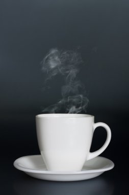 White cup with hot liquid and steam clipart