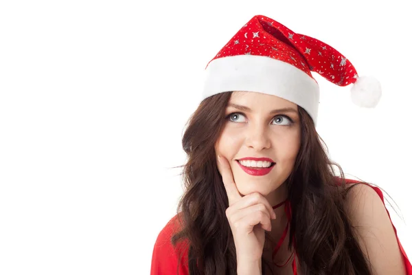 Усміхнена дівчина Санта дивиться на копійку ізольована над білим — стокове фото