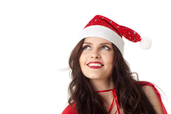 Усміхнена дівчина Санта дивиться на копійку ізольована над білим — стокове фото