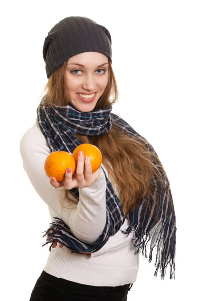 Mulher feliz com laranja em fundo branco — Fotografia de Stock