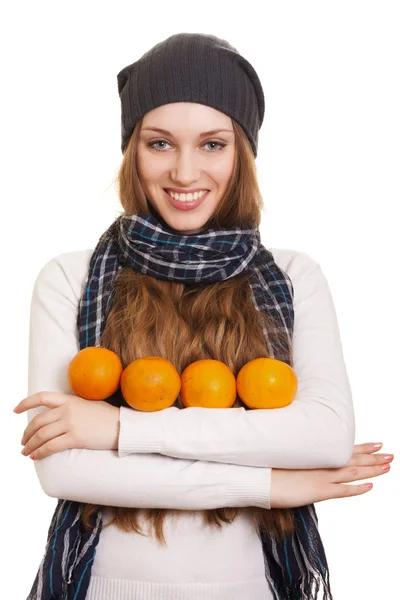 stock image Happy woman with orange on white background