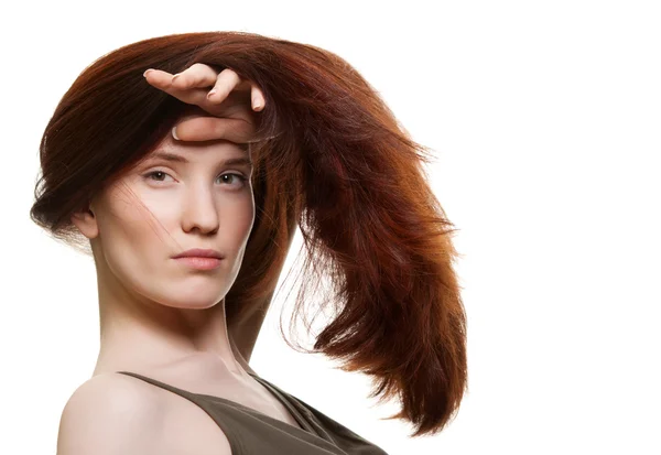 Portret van een mooie jonge vrouw met prachtige haren — Stockfoto