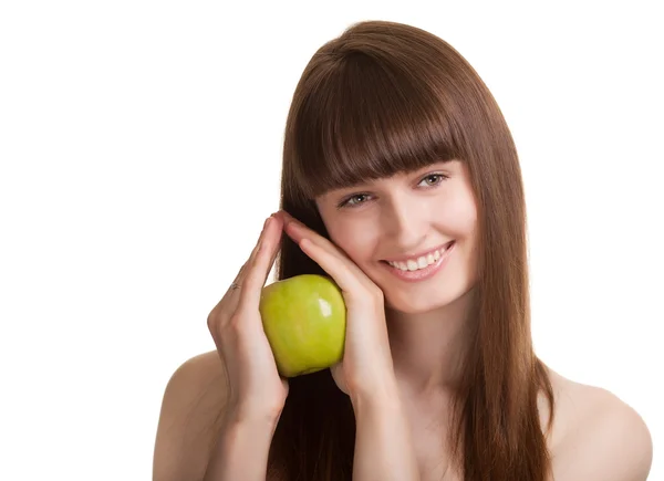 Молодая женщина счастливый улыбающийся с зеленым яблоком, изолированные на белом — стоковое фото