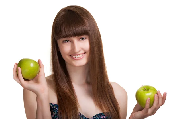 白で隔離される緑の apple と若い幸せな笑顔の女性 — ストック写真