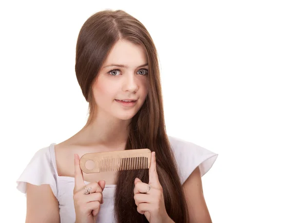 Portrait of a beautiful youth teen girl with comb isolated — Stock Photo, Image