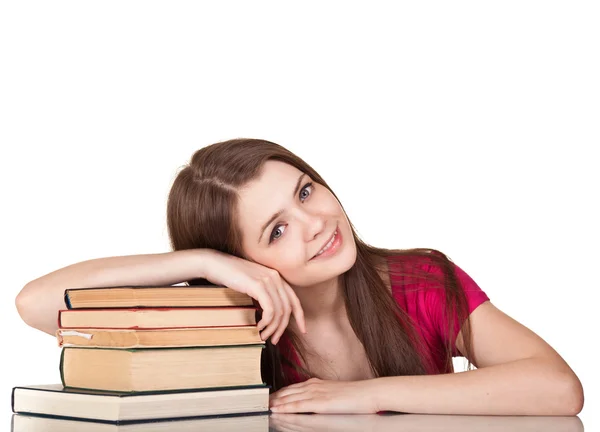 Adolescente chica con un montón de libros, aislado en blanco —  Fotos de Stock