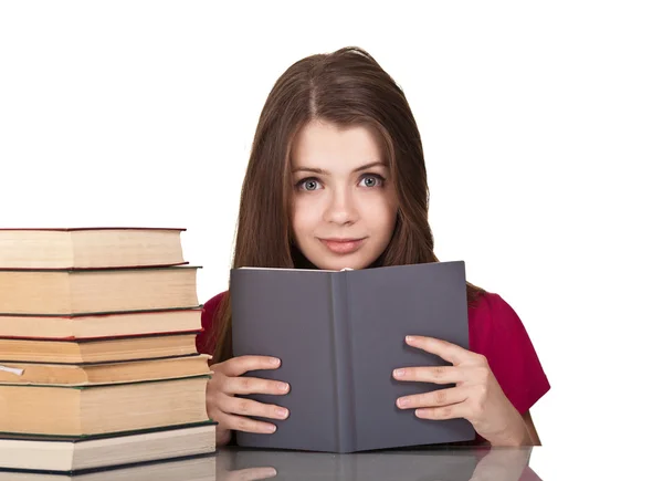 Κορίτσι, με πολλά βιβλία γύρω από, απομονωμένα σε λευκό — Φωτογραφία Αρχείου
