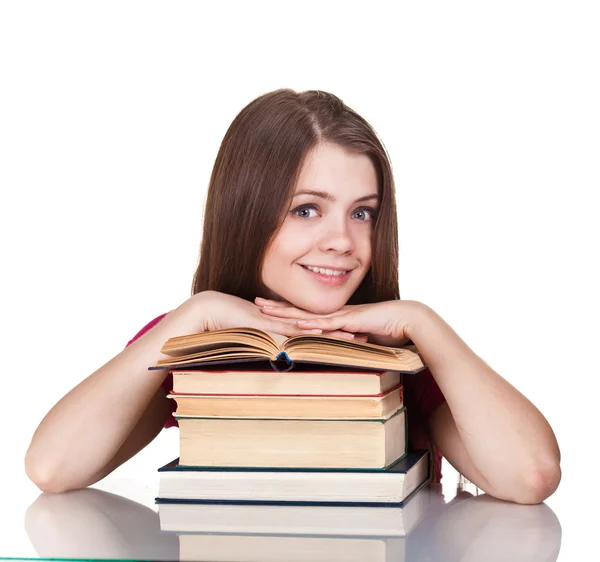Teen flicka med massa böcker, isolerad på vit — Stockfoto