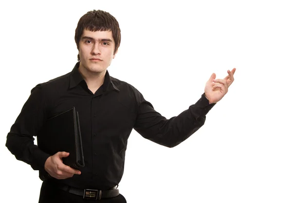 Seriöser Mann im schwarzen Hemd mit Buch isoliert auf weißem backgroun — Stockfoto