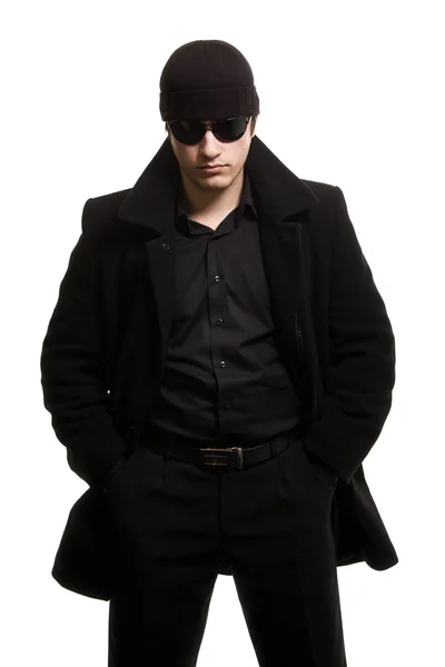 Förtroendet man i svart rock och solglasögon — Stockfoto