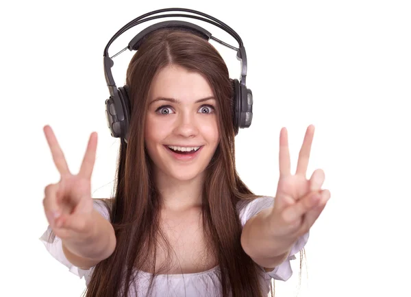 Ελκυστική χαμογελαστό γυναίκα με ακουστικά σε άσπρο φόντο — Φωτογραφία Αρχείου