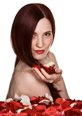 Beautiful woman and rose petals on white background clipart