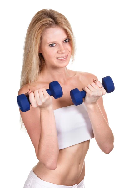 Portrait of a happy sporty woman with a dumbbell on white backgr — Stock Photo, Image