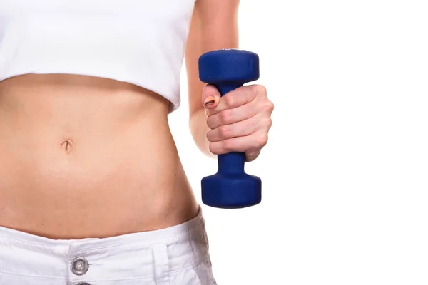 Sporty woman with a dumbbell close-up on white background — Stock Photo, Image
