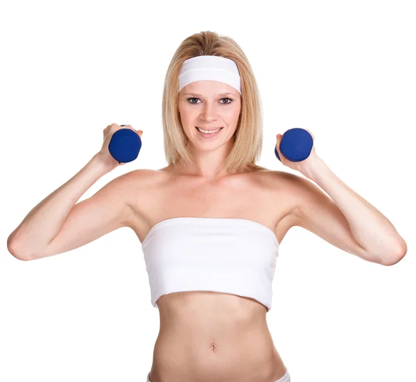 Portrait of a happy sporty woman with a dumbbell on white backgr — Stock Photo, Image